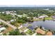 This is an aerial perspective of a waterway lined by beautiful homes that have docks for boats and watercraft at 474 Lomond Dr, Port Charlotte, FL 33953