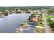 Waterfront homes with serene canal views, lush greenery, and a peaceful residential setting at 474 Lomond Dr, Port Charlotte, FL 33953
