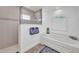 Bright bathroom featuring a soaking tub and separate glass-enclosed shower at 474 Lomond Dr, Port Charlotte, FL 33953