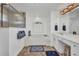 Elegant bathroom with a soaking tub, tiled floors, vanity, and walk-in shower at 474 Lomond Dr, Port Charlotte, FL 33953