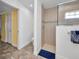 Bathroom featuring a tiled shower and separate toilet area for added privacy at 474 Lomond Dr, Port Charlotte, FL 33953
