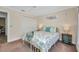 Comfortable bedroom with carpeted floors, ceiling fan, and closet space at 474 Lomond Dr, Port Charlotte, FL 33953