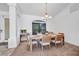 Well-lit dining room with a large table, seating for six, and shiplap accent wall at 474 Lomond Dr, Port Charlotte, FL 33953
