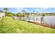Lovely waterfront views with a private dock and well-manicured lawn at 474 Lomond Dr, Port Charlotte, FL 33953