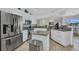Modern kitchen with granite countertops, stainless steel appliances, and ample cabinet space at 474 Lomond Dr, Port Charlotte, FL 33953