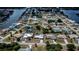 Aerial view of property including roof and surrounding neighborhood with waterfront access at 543 Mayview Nw Ave, Port Charlotte, FL 33952