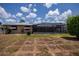 Spacious backyard view showcasing a screened-in pool and patio area, great for entertaining at 543 Mayview Nw Ave, Port Charlotte, FL 33952