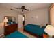 Charming bedroom with twin beds, classic dresser, and neutral walls with modern accents for a relaxing atmosphere at 543 Mayview Nw Ave, Port Charlotte, FL 33952