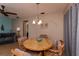 Cozy dining room with wood table, chandelier, and coastal decor at 543 Mayview Nw Ave, Port Charlotte, FL 33952