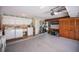 Attached garage featuring laundry area, storage, and room for multiple vehicles at 543 Mayview Nw Ave, Port Charlotte, FL 33952
