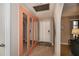 Hallway with mirrored wall feature at 543 Mayview Nw Ave, Port Charlotte, FL 33952