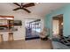 Open living space features sliding doors to the pool area at 543 Mayview Nw Ave, Port Charlotte, FL 33952