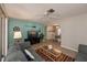 View of living room with decorative ocean themed wall accents at 543 Mayview Nw Ave, Port Charlotte, FL 33952