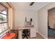 Home office area with desk, chair, and natural light at 543 Mayview Nw Ave, Port Charlotte, FL 33952