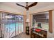 Inviting pool area with screened-in enclosure viewed from inside the house at 543 Mayview Nw Ave, Port Charlotte, FL 33952