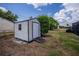 A storage shed for tools and equipment is located in the backyard at 543 Mayview Nw Ave, Port Charlotte, FL 33952