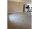 Open concept dining and kitchen area with tile floors, breakfast bar, and stainless steel appliances at 635 W Tarpon Nw Blvd, Port Charlotte, FL 33952