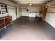 Spacious garage with laundry hookups, shelving, and plenty of room for storage at 635 W Tarpon Nw Blvd, Port Charlotte, FL 33952