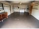 Spacious garage interior with shelves and laundry area, ready for storage and projects at 635 W Tarpon Nw Blvd, Port Charlotte, FL 33952