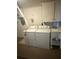 The home's laundry room with washer, dryer and sink at 635 W Tarpon Nw Blvd, Port Charlotte, FL 33952