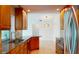 Kitchen features stainless steel appliances, granite countertop, and wood cabinets at 745 Monaco Dr, Punta Gorda, FL 33950