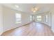Bright living room with wood floors, bay window and exterior views at 745 Monaco Dr, Punta Gorda, FL 33950
