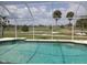Relaxing screened-in pool with scenic golf course views at 745 Monaco Dr, Punta Gorda, FL 33950