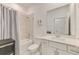 Bathroom featuring a tub and shower, a toilet, and vanity with a mirror and modern fixtures for convenience at 10995 Pinot Dr, Venice, FL 34293