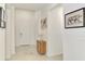 Bright foyer with neutral walls, decor, tiled floors, and a view to the living spaces at 10995 Pinot Dr, Venice, FL 34293