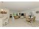 Spacious living room and dining area filled with natural light and stylish furnishings at 10995 Pinot Dr, Venice, FL 34293