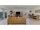 Bright and airy living area with modern furniture and a dining area at 10995 Pinot Dr, Venice, FL 34293