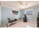 Light and airy exercise room with large windows that offer a water view at 12596 Bacchus Rd, Port Charlotte, FL 33981