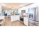 Modern kitchen with stainless steel appliances and granite counters at 12596 Bacchus Rd, Port Charlotte, FL 33981