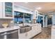 Modern kitchen sink and granite counters, with backyard view at 12596 Bacchus Rd, Port Charlotte, FL 33981