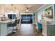 Open living space with view of backyard, featuring sleek wood floors and modern decor at 12596 Bacchus Rd, Port Charlotte, FL 33981
