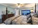 Bedroom featuring a decorative bed, lamps and a view of the pool at 12596 Bacchus Rd, Port Charlotte, FL 33981