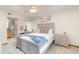 Comfortable main bedroom with carpeted floor, ceiling fan with light and ensuite bathroom at 150 Harborside Ave # 306, Punta Gorda, FL 33950