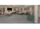 Large meeting room with tables and chairs provides a versatile space for community gatherings and events at 150 Harborside Ave # 306, Punta Gorda, FL 33950