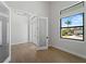 Office featuring contemporary lighting, lots of natural light and attractive floors at 15504 Melport Cir, Port Charlotte, FL 33981