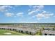 Expansive aerial view showcasing the real estate's location on a golf course community at 15990 Grassland Ln # 3024, Punta Gorda, FL 33982