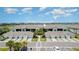 Aerial view of well-maintained townhouses, showcasing their prime location and community at 15990 Grassland Ln # 3024, Punta Gorda, FL 33982