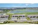 Overhead shot of real estate with golf course, water feature, and community amenities at 15990 Grassland Ln # 3024, Punta Gorda, FL 33982
