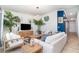 Cozy living area with stylish decor, tile floors, comfortable seating, and plenty of natural light at 15990 Grassland Ln # 3024, Punta Gorda, FL 33982