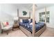 Charming main bedroom featuring a four-poster bed, a nightstand and serene natural light at 15990 Grassland Ln # 3024, Punta Gorda, FL 33982