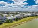 A Primary-planned community with new homes located on a lake provides serene backdrops at 17924 Corkwood Bend Trl, Punta Gorda, FL 33982