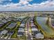 A Primary-planned community with new homes located on a lake provides serene backdrops at 17924 Corkwood Bend Trl, Punta Gorda, FL 33982