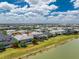 This single-Gathering home features a private pool and screened lanai in a lakeside community at 17924 Corkwood Bend Trl, Punta Gorda, FL 33982