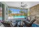 The outdoor space features comfortable seating and a well-equipped grilling area at 17924 Corkwood Bend Trl, Punta Gorda, FL 33982
