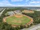 Aerial view of baseball fields surrounded by lush greenery at 1993 E Isles Rd, Port Charlotte, FL 33953
