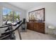 This exercise room features a treadmill and other equipment, perfect for staying in shape at 1993 E Isles Rd, Port Charlotte, FL 33953